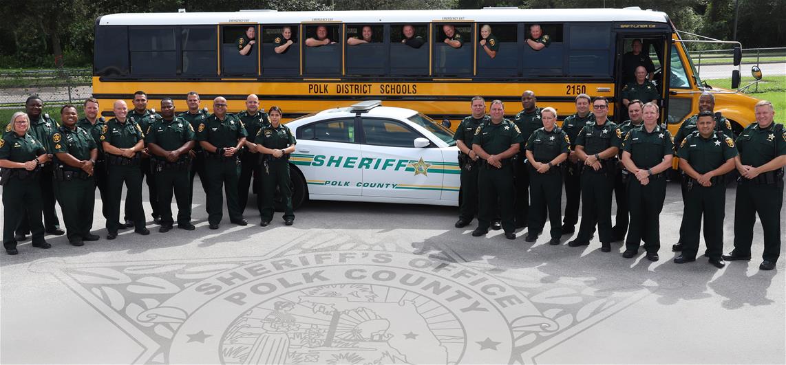 safe schools deputies in front of bus